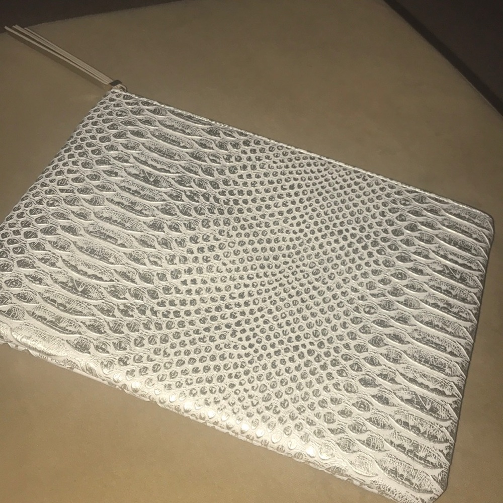 Never used Stella & Dot clutch